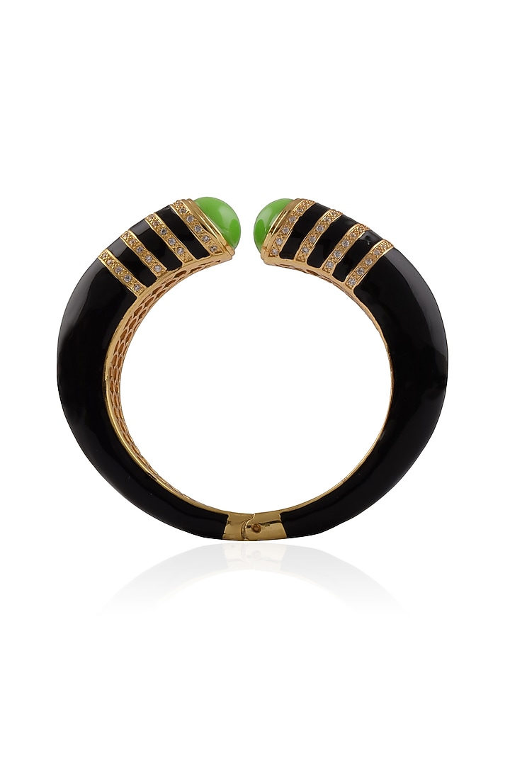The Bohemian presents Black pyramid enamel bangle available only at Pernia's Pop Up Shop.