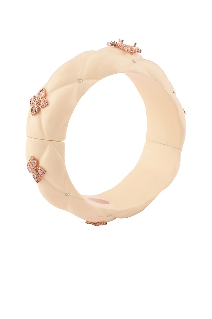 The Bohemian presents Rose gold plated white star motif resin bangle available only at Pernia's Pop Up Shop.