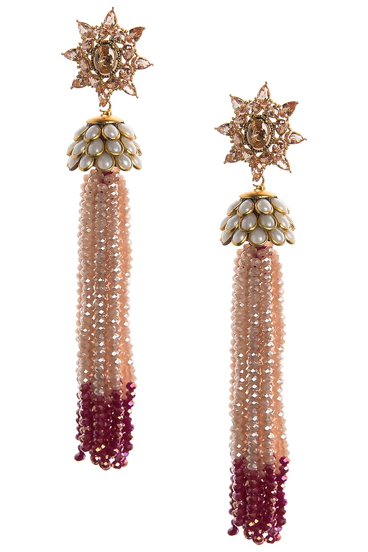 White and coral tassel earrings available only at Pernia's Pop Up Shop.