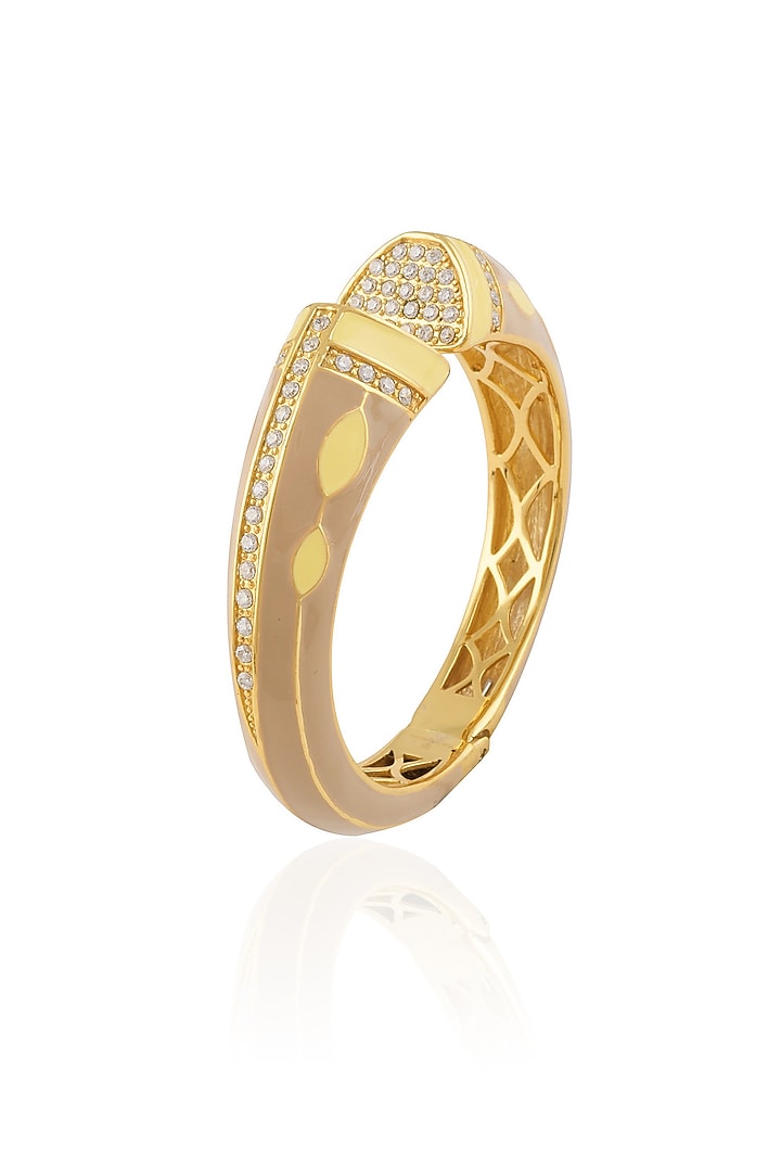The Bohemian presents Gold plated khakhi and yellow enamel colossal bangle available only at Pernia's Pop Up Shop.