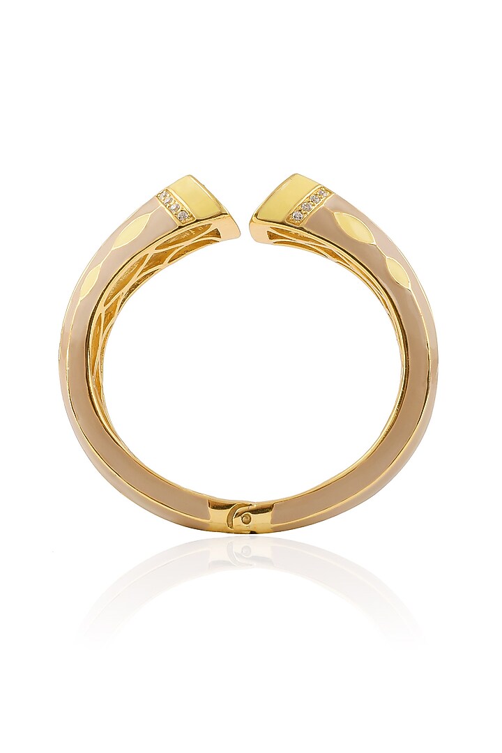 The Bohemian presents Gold plated khakhi and yellow enamel colossal bangle available only at Pernia's Pop Up Shop.
