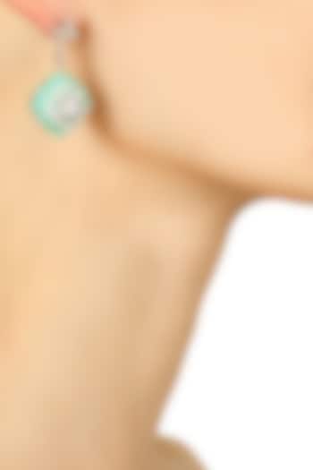 Rhodium plated north star earrings available only at Pernia's Pop Up Shop.