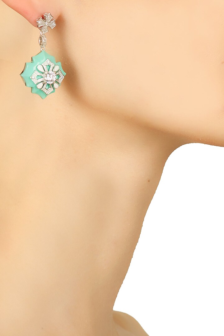 Rhodium plated north star earrings available only at Pernia's Pop Up Shop.