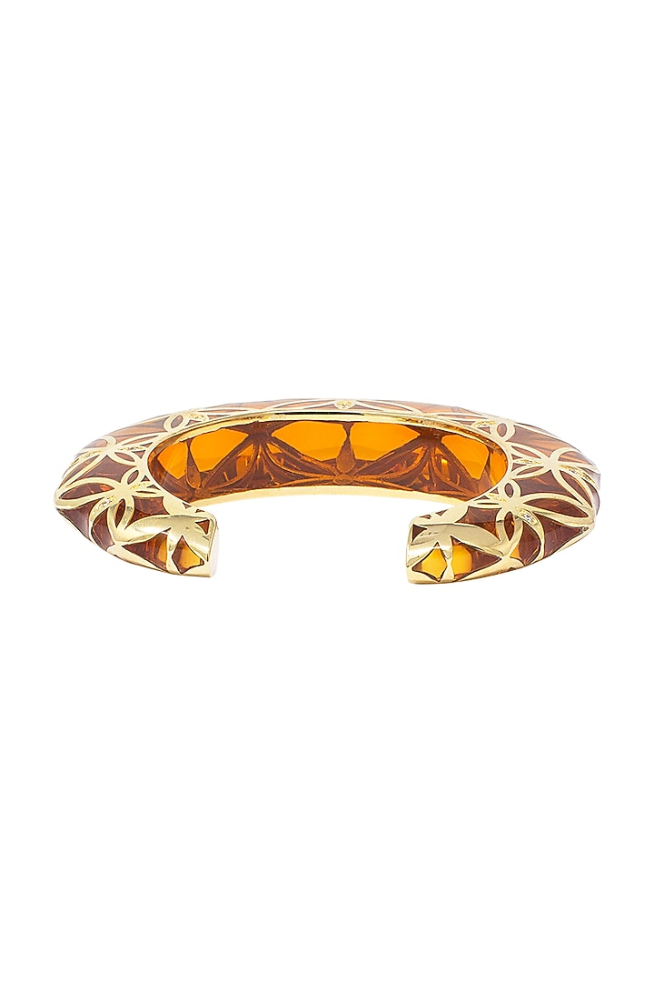 Gold plated transparent red cuff available only at Pernia's Pop Up Shop.