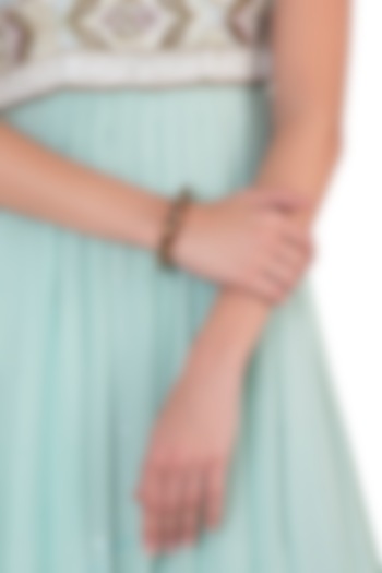 Gold plated amber cuff available only at Pernia's Pop Up Shop.