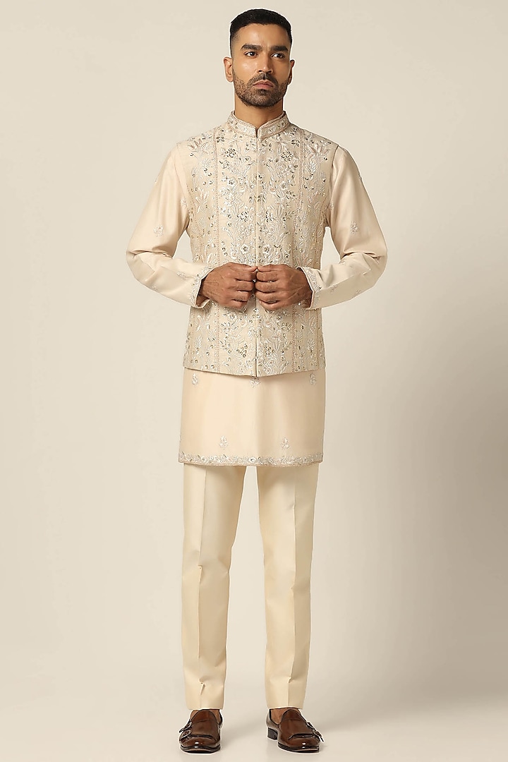 Beige Raw Silk Floral Embroidered Nehru Jacket Set by BRAHAAN