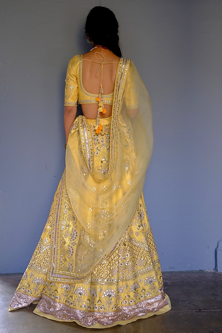 Yellow Silk Chanderi Floral Motif Embroidered Wedding Lehenga Set by Bruhi pant at Pernia's Pop Up Shop