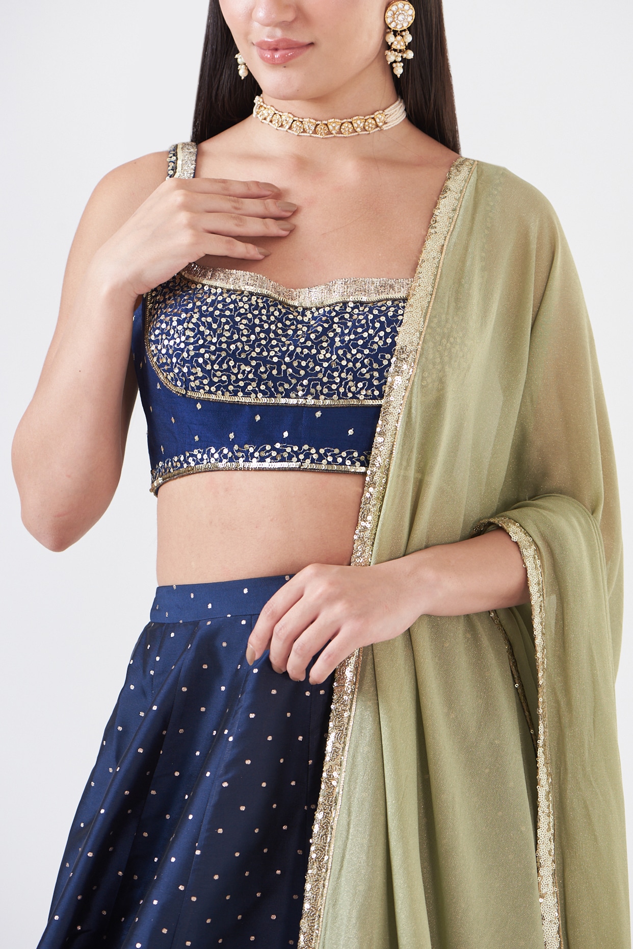 OLIVE GREEN HAND CRAFTED PATOLA SILK LEHENGA WITH EMBROIDERED SILK BLO –  zarikaariindia.com