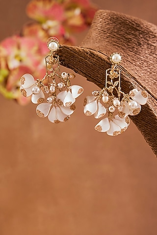 White Enameled Floral Dangler Earrings by THE BEAUTIFUL SECRET