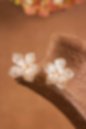 White Enameled Floral Stud Earrings by THE BEAUTIFUL SECRET at Pernia's Pop Up Shop