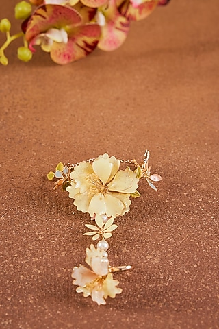 Yellow Enameled Floral Hathphool by THE BEAUTIFUL SECRET