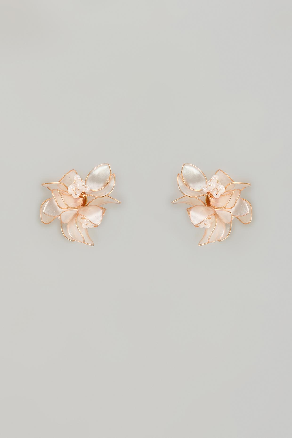 Gold Finish White Enameled Floral Stud Earrings by THE BEAUTIFUL SECRET at Pernia's Pop Up Shop