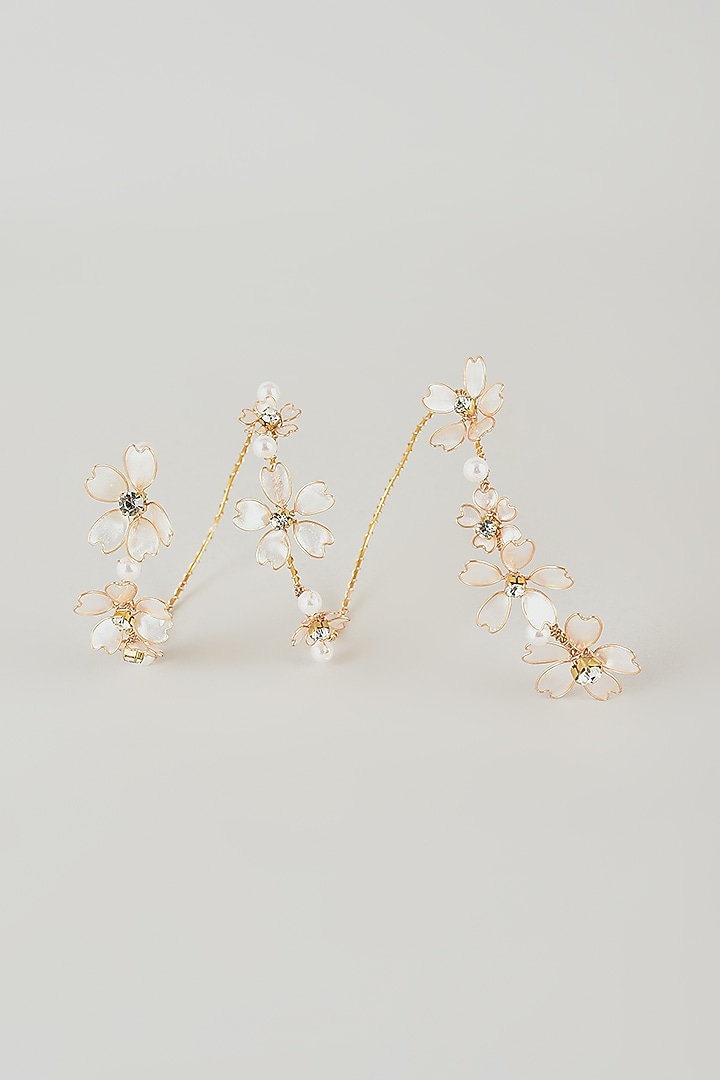 White Floral Bracelet by THE BEAUTIFUL SECRET at Pernia's Pop Up Shop