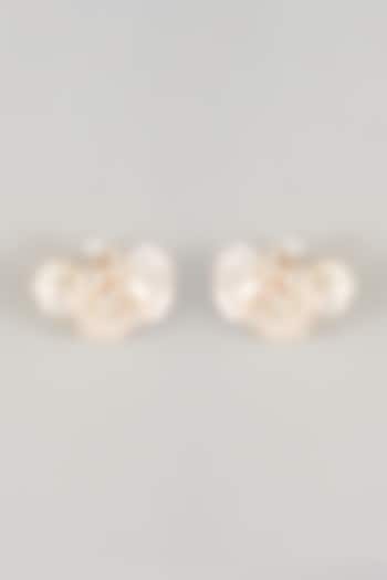 White Resin Floral Stud Earrings by THE BEAUTIFUL SECRET at Pernia's Pop Up Shop