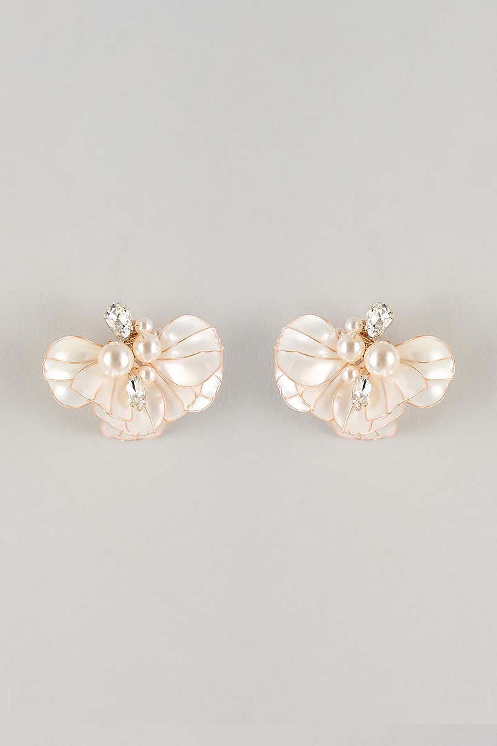White Resin Floral Stud Earrings by THE BEAUTIFUL SECRET at Pernia's Pop Up Shop