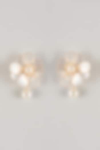 White Resin Floral Dangler Earrings by THE BEAUTIFUL SECRET at Pernia's Pop Up Shop