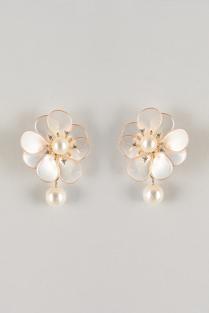 White Resin Floral Dangler Earrings by THE BEAUTIFUL SECRET at Pernia's Pop Up Shop