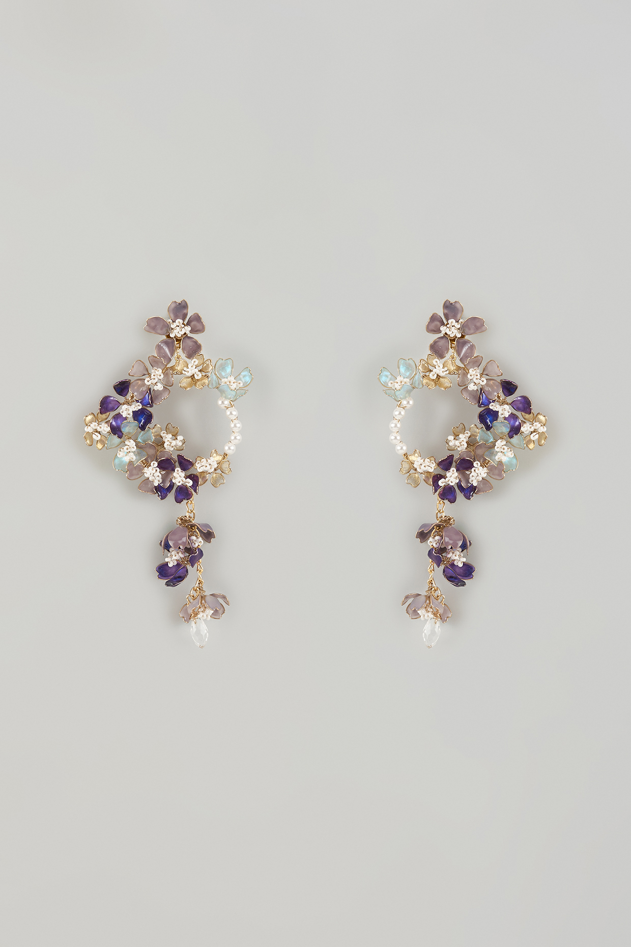 Gold Finish Blue Enameled Floral Hoop Earrings by THE BEAUTIFUL SECRET at Pernia's Pop Up Shop