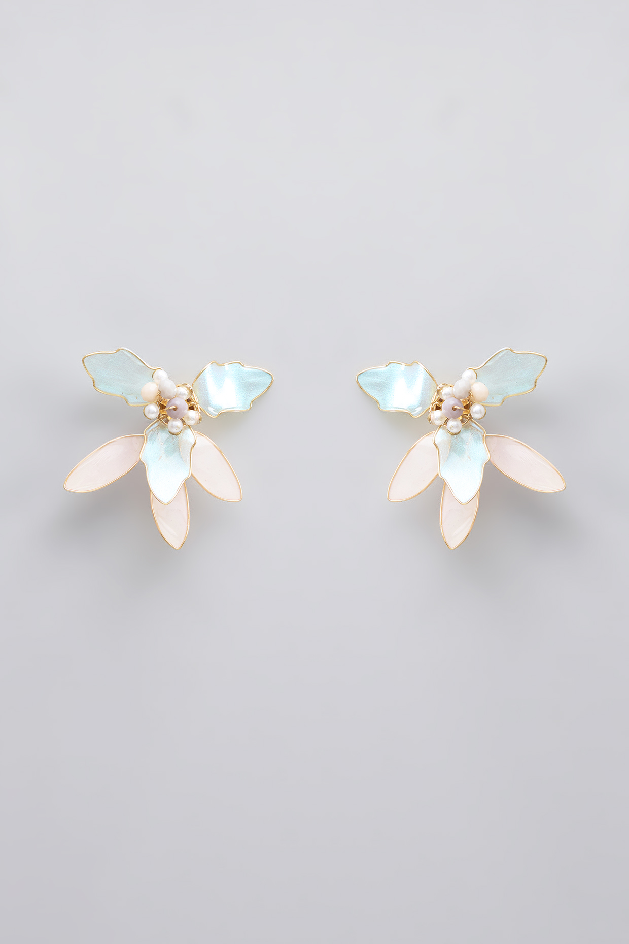Gold Finish Blue Enameled Floral Stud Earrings by THE BEAUTIFUL SECRET at Pernia's Pop Up Shop