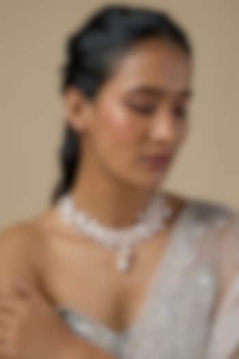 White Enameled Floral Necklace by THE BEAUTIFUL SECRET at Pernia's Pop Up Shop