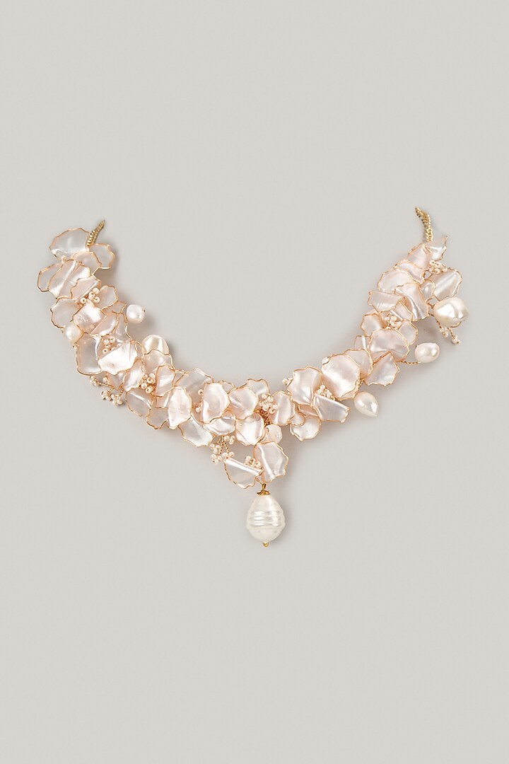 White Enameled Floral Necklace by THE BEAUTIFUL SECRET at Pernia's Pop Up Shop