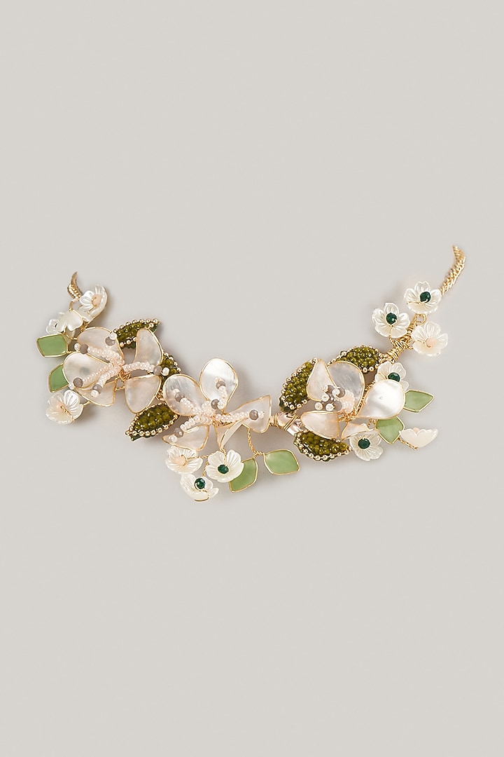 White Enameled Floral Necklace by THE BEAUTIFUL SECRET at Pernia's Pop Up Shop