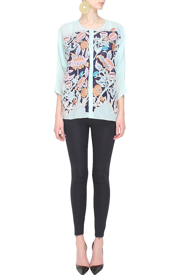 Light blue floral embroidered loose top available only at Pernia's Pop Up Shop.