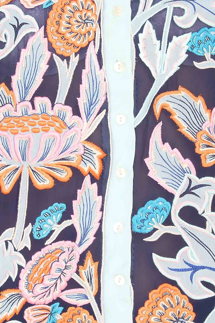 Light blue floral embroidered loose top available only at Pernia's Pop Up Shop.
