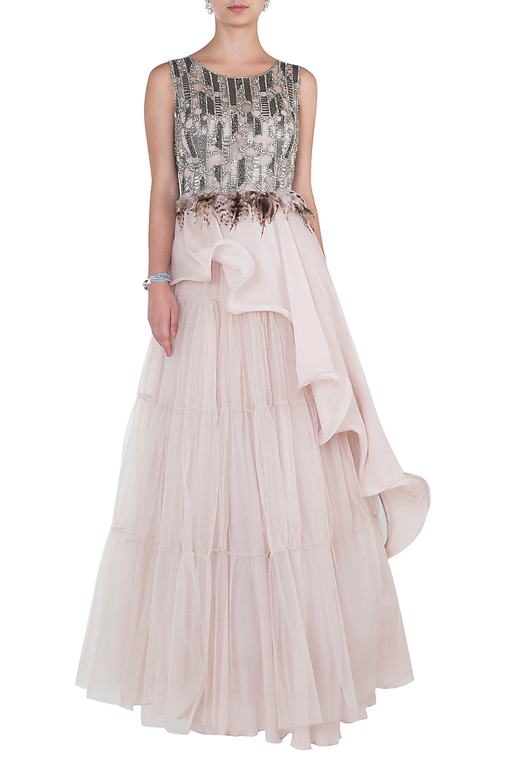 Nude embroidered asymmetrical top with lehenga skirt available only at Pernia's Pop Up Shop.