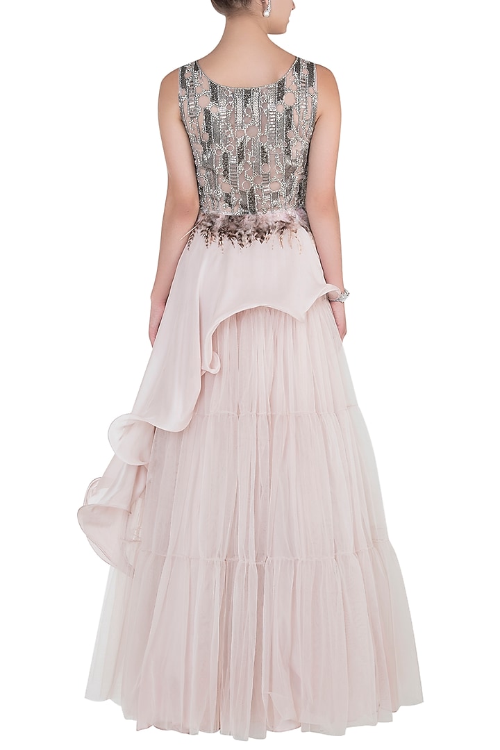 Nude embroidered asymmetrical top with lehenga skirt available only at Pernia's Pop Up Shop.
