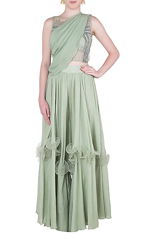 Green embroidered crop top with pants and draped sash by Babita Malkani