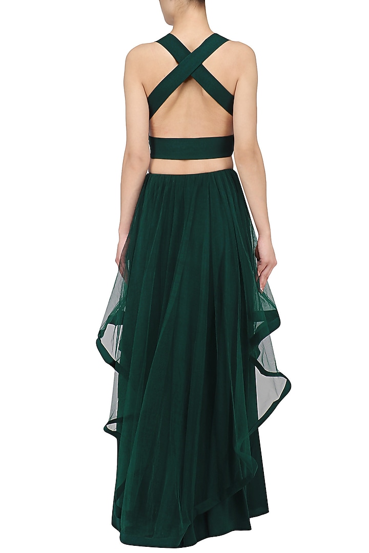 Midnight green asymmetrical lehenga set available only at Pernia's Pop Up Shop.
