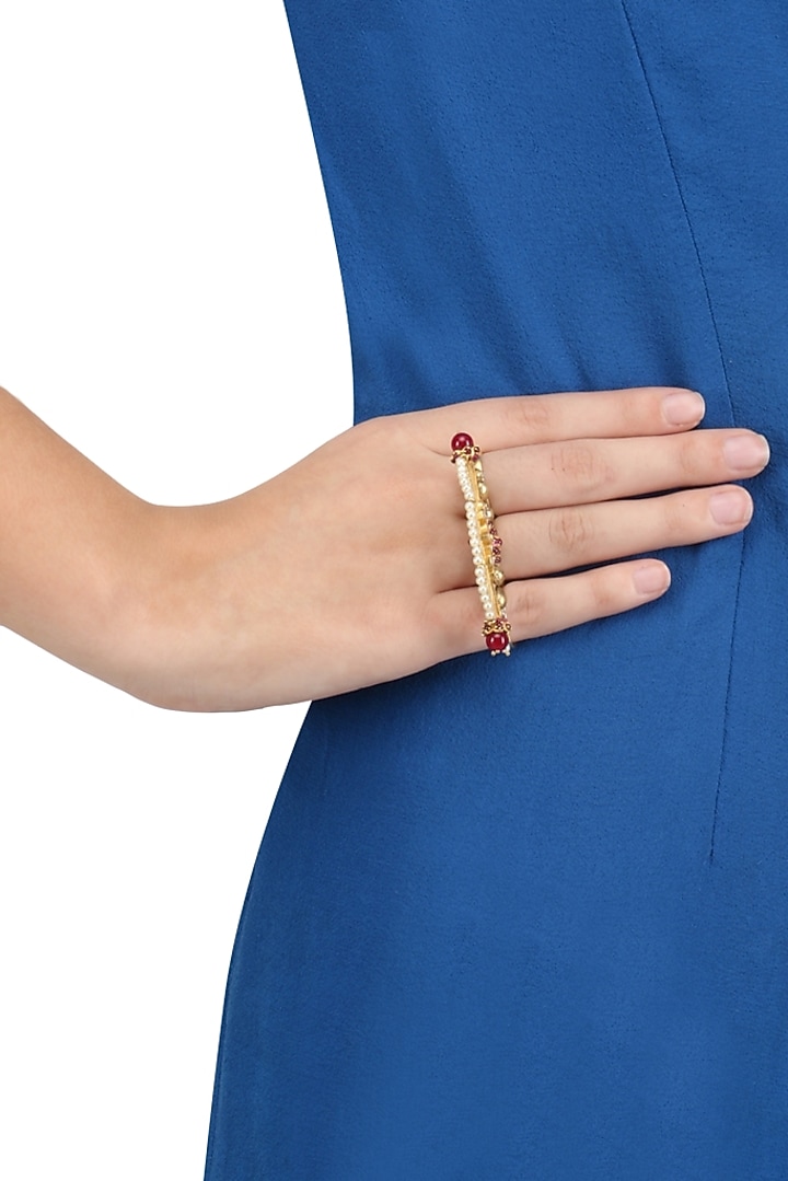 Blue Turban presents Gold plated wire jali and bird motif three finger ring available only at Pernia's Pop Up Shop.