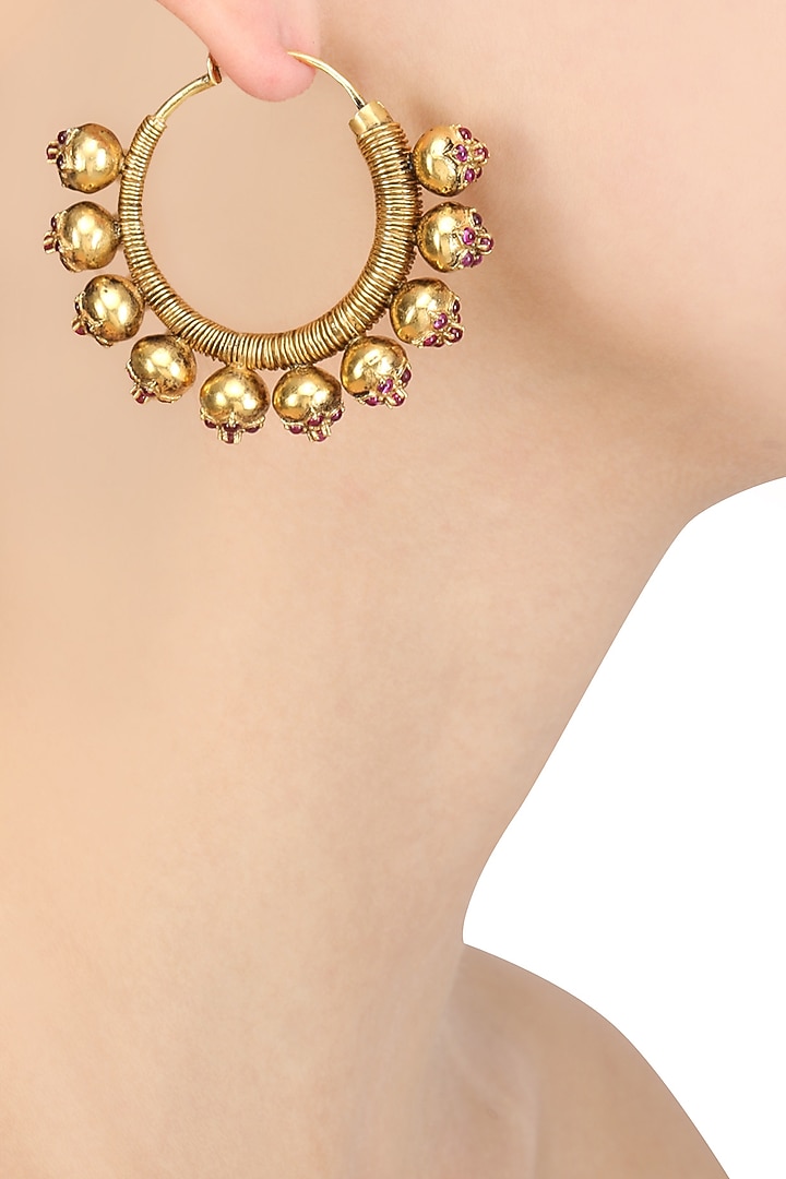 Blue Turban presents Gold plated red stone flower motifs hoop earrings available only at Pernia's Pop Up Shop.