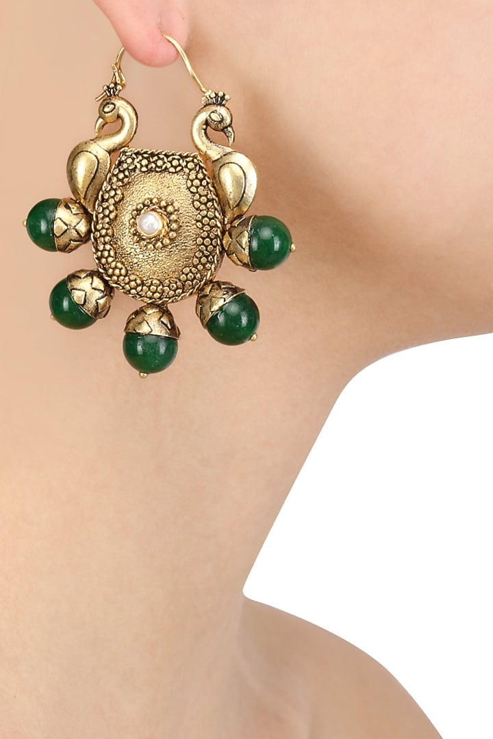 Blue Turban presents Gold plated double domed peacocks and green stone earrings available only at Pernia's Pop Up Shop.