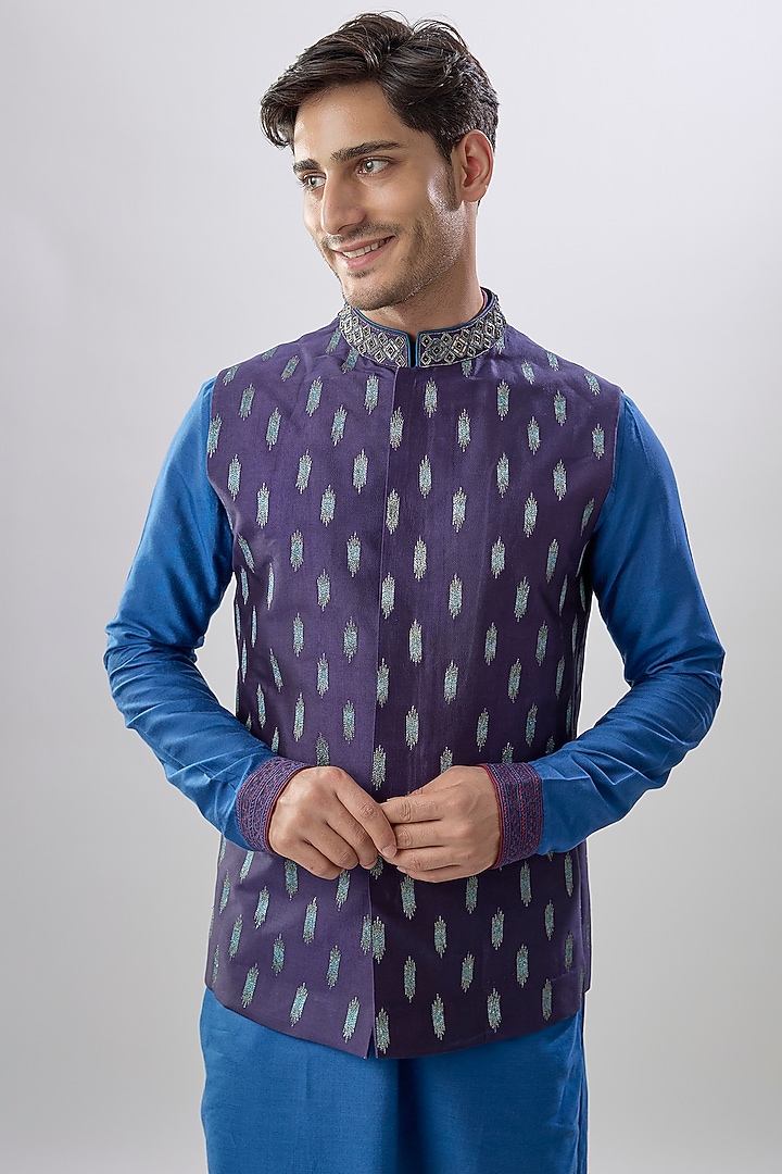 Blue Chiniya Silk Ikat Printed & Kasab Embroidered Bundi Jacket by Bubber Couture at Pernia's Pop Up Shop