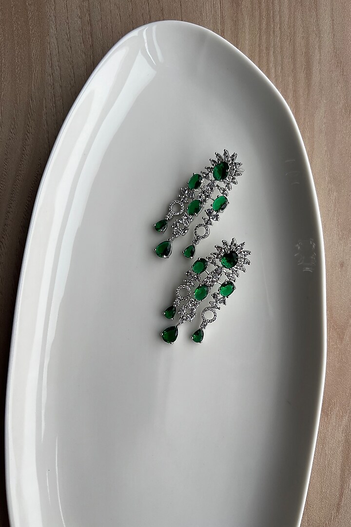 White Rhodium Finish Zirconia & Green Stones Dangler Earrings by Bubber Jewels at Pernia's Pop Up Shop