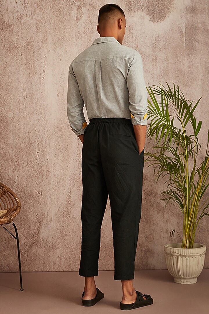 Black Cotton Twill Pleated Pants by BLUEHOUR at Pernia's Pop Up Shop