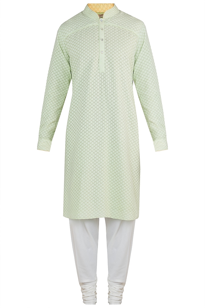 Green kurta with churidar pants by Bubber Couture