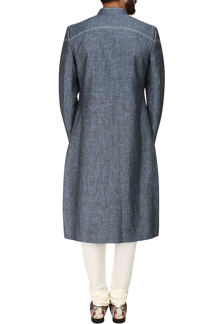 Denim blue and grey quilted sherwani with beige pocket square and churidaar pants available only at Pernia's Pop Up Shop