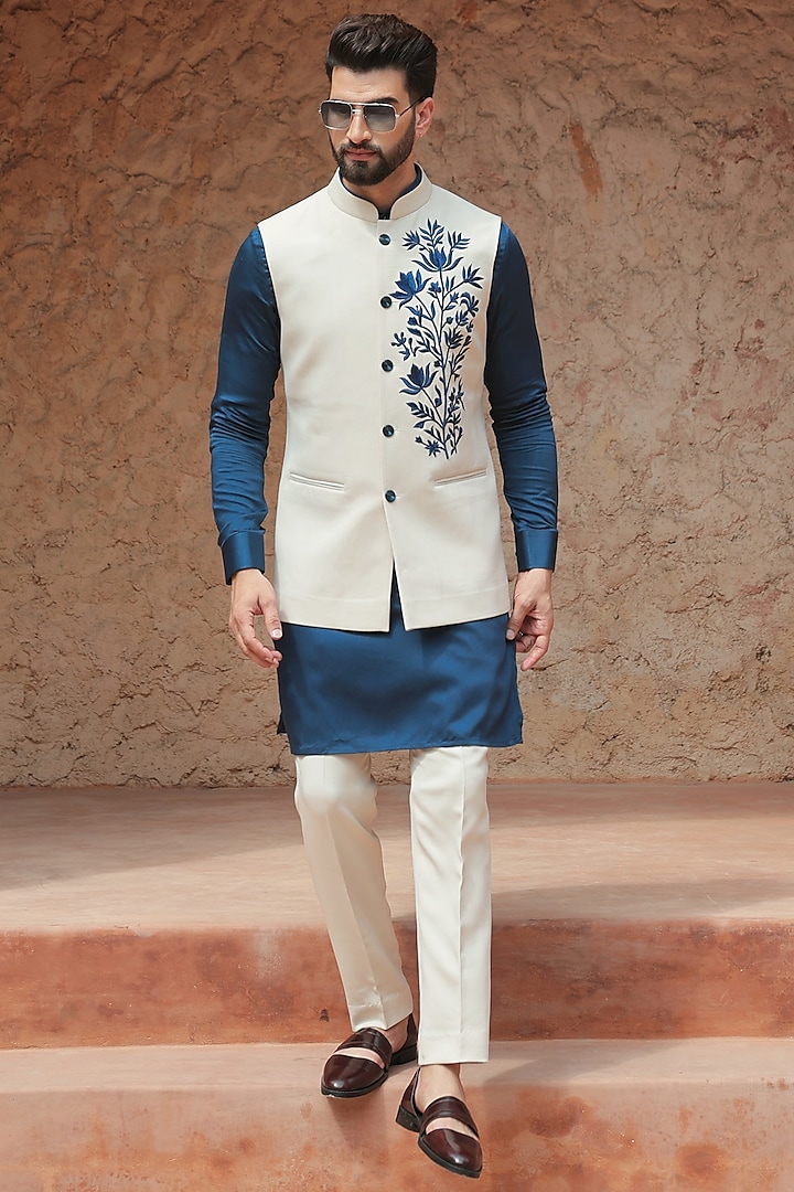 Ivory Crepe Blend Thread Embroidered Nehru Jacket Set by Bhavya Bhasin