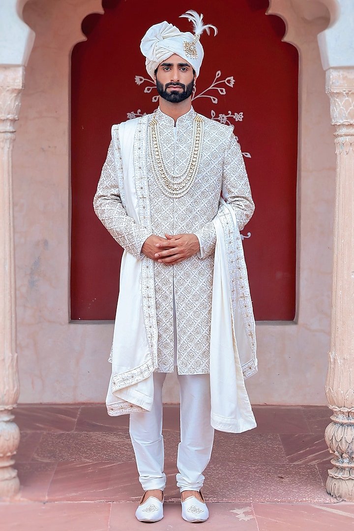 Ivory Raw Silk Gold Hand Embroidered Sherwani Set by Bhavya Bhasin