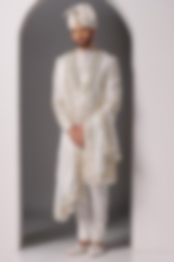 Ivory Raw Silk Embroidered Groom Sherwani Set by Bhavya Bhasin at Pernia's Pop Up Shop