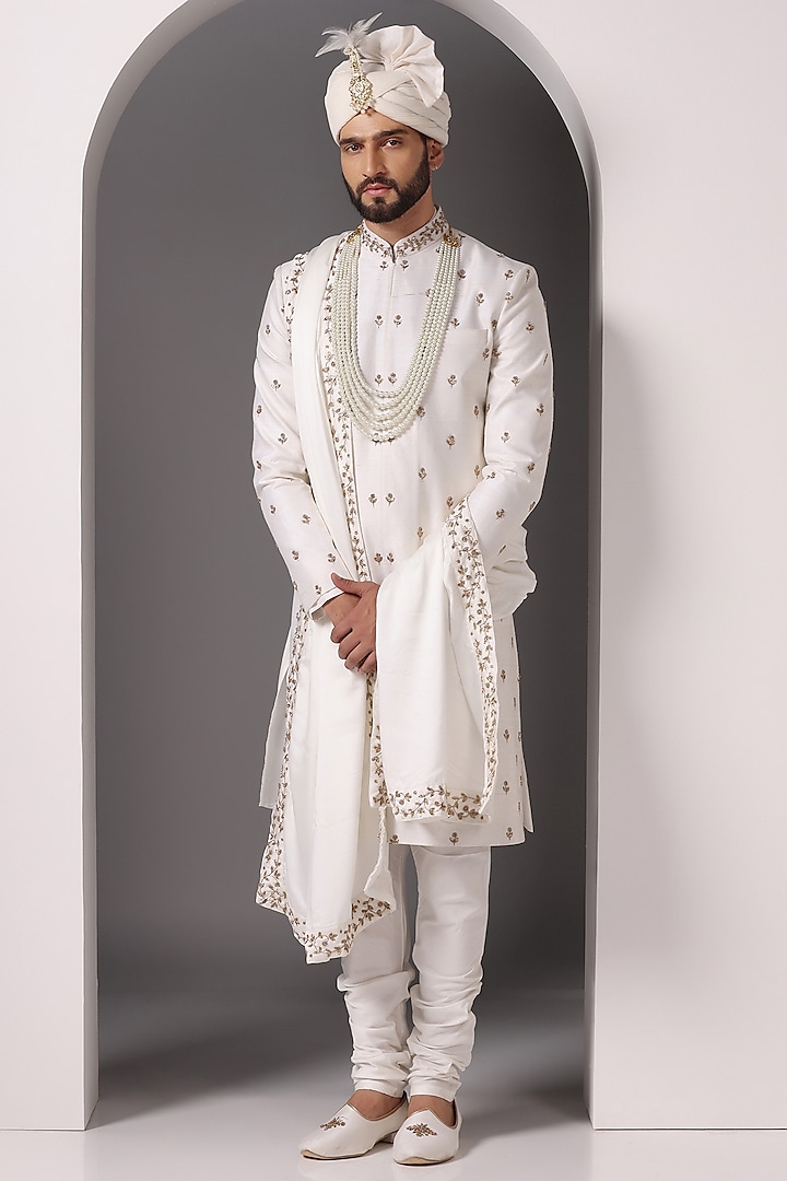 Ivory Raw Silk Embroidered Sherwani Set by Bhavya Bhasin