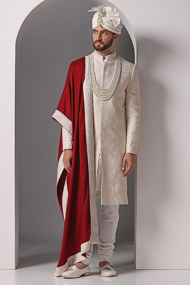 Ivory Raw Silk Embroidered Sherwani Set by Bhavya Bhasin