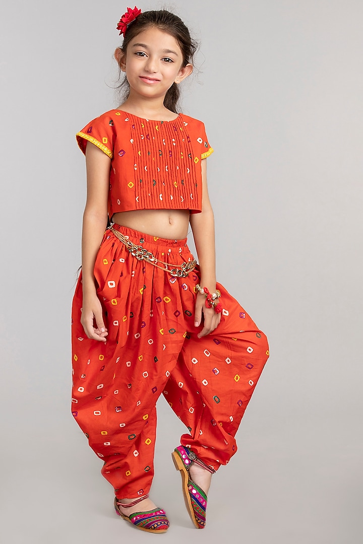Orange Printed Dhoti Set For Girls by BYB PREMIUM