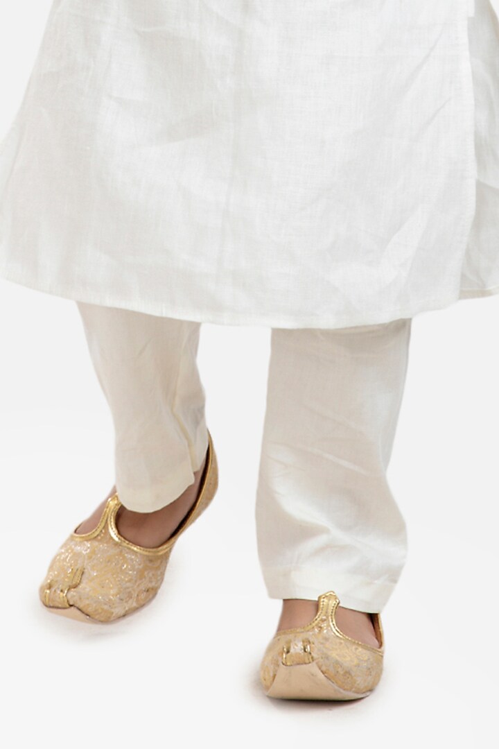 Ivory Linen Kurta Set With Bundi Jacket For Boys by BYB PREMIUM at Pernia's Pop Up Shop