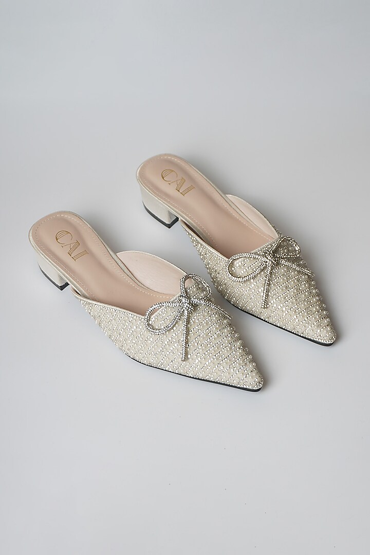 White PU & Vegan Leather Bow Embellished Mule Heels by CAI at Pernia's Pop Up Shop