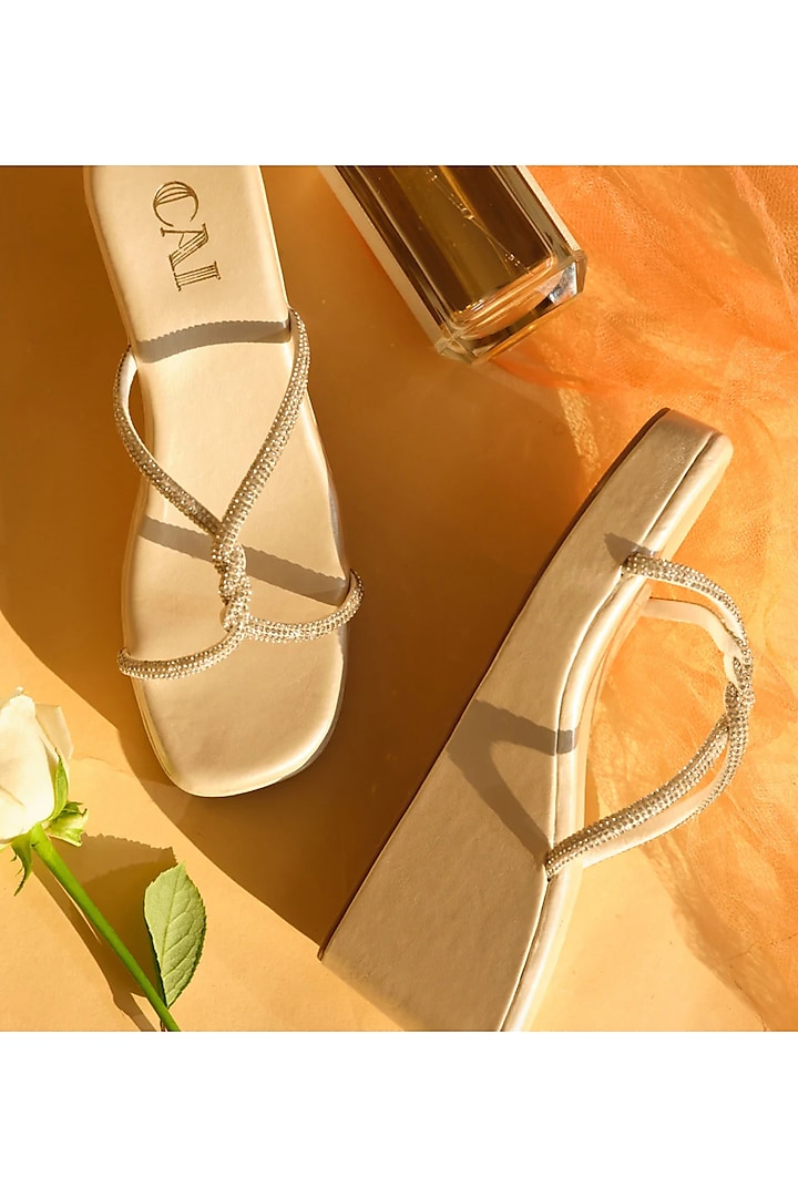 Silver Faux Leather Wedges by CAI at Pernia's Pop Up Shop