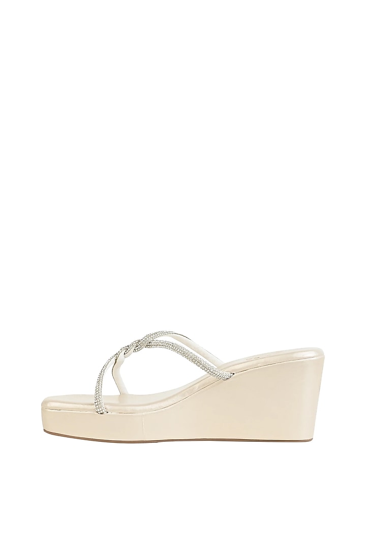 Silver Faux Leather Wedges by CAI at Pernia's Pop Up Shop